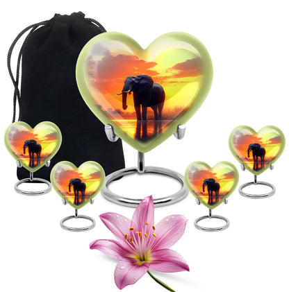 Matte Gold Elephant Cremation Urn close-up of engraving and surface detail - compassionate heart-elephant combination with gentle curves - memorial set with one large and four small urns