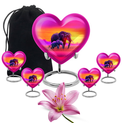 Blush Pink Elephant Cremation Urn close-up of engraving and surface detail - loving heart memorial featuring elephant pattern - memorial set with one large and four small urns