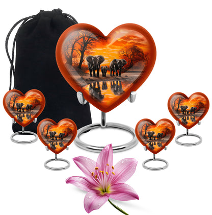 Royal Gold Elephant Cremation Urn close-up of engraving and surface detail - romantic heart urn with elephant motif on aluminum - memorial set with one large and four small urns