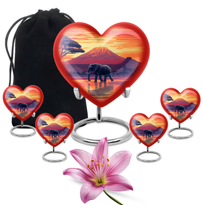 Gilded Gold Elephant Cremation Urn close-up of engraving and surface detail - loving heart memorial featuring elephant pattern - memorial set with one large and four small urns