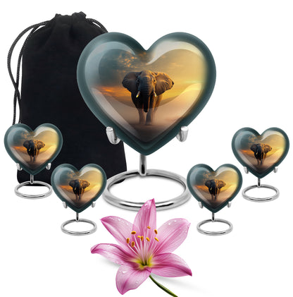 Jet Black Elephant Cremation Urn close-up of engraving and surface detail - loving heart memorial featuring elephant pattern - memorial set with one large and four small urns