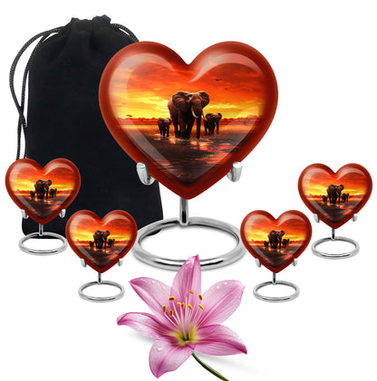 Ruby Red Elephant Cremation Urn close-up of engraving and surface detail - compassionate heart-elephant combination with gentle curves - memorial set with one large and four small urns