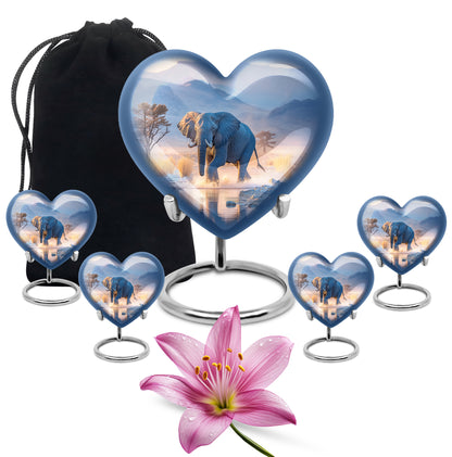 Bright Blue Elephant Cremation Urn close-up of engraving and surface detail - compassionate heart-elephant combination with gentle curves - memorial set with one large and four small urns