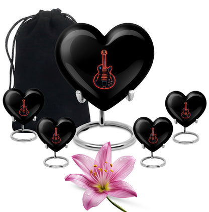 Obsidian Black Guitar Cremation Urn close-up of engraving and surface detail - compassionate heart-guitar combination with gentle curves - memorial set with one large and four small urns