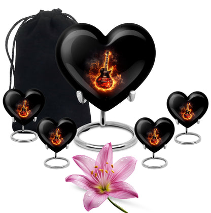 Rich Black Guitar Cremation Urn close-up of engraving and surface detail - loving heart memorial featuring guitar pattern - memorial set with one large and four small urns