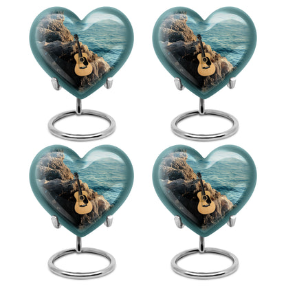 Mystic Teal Guitar Cremation Urn angled view of lid and engraved motif - compassionate heart-guitar combination with gentle curves - 10 inch aluminum urn for cremated remains