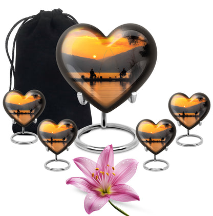Gilded Gold Fishing Cremation Urn close-up of engraving and surface detail - heart-shaped fishing design symbolizing eternal love - memorial set with one large and four small urns