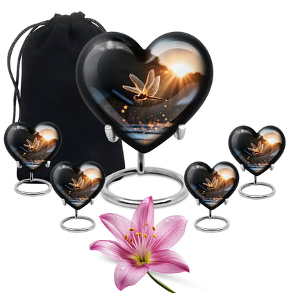 Deep Black Dragonfly Cremation Urn close-up of engraving and surface detail - heart-shaped dragonfly design symbolizing eternal love - memorial set with one large and four small urns