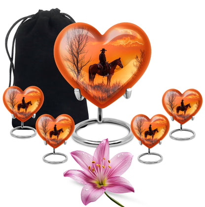 Fiery Red Cowboy Cremation Urn close-up of engraving and surface detail - romantic heart urn with cowboy motif on aluminum - memorial set with one large and four small urns