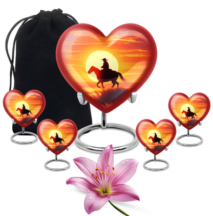 Ruby Red Cowboy Cremation Urn close-up of engraving and surface detail - romantic heart urn with cowboy motif on aluminum - memorial set with one large and four small urns
