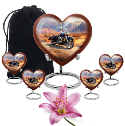 Antique Gold Bike Cremation Urn close-up of engraving and surface detail - heart-shaped bike design symbolizing eternal love - memorial set with one large and four small urns