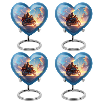 Icy Blue Bike Cremation Urn angled view of lid and engraved motif - heart-shaped bike design symbolizing eternal love - 10 inch aluminum urn for cremated remains