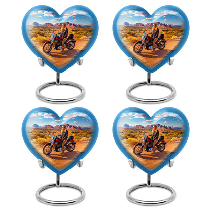 Steel Blue Bike Cremation Urn angled view of lid and engraved motif - compassionate heart-bike combination with gentle curves - 10 inch aluminum urn for cremated remains