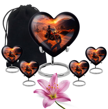 Burnished Gold Bike Cremation Urn close-up of engraving and surface detail - romantic heart urn with bike motif on aluminum - memorial set with one large and four small urns