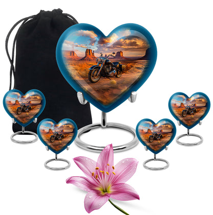 Cornflower Blue Bike Cremation Urn close-up of engraving and surface detail - compassionate heart-bike combination with gentle curves - memorial set with one large and four small urns