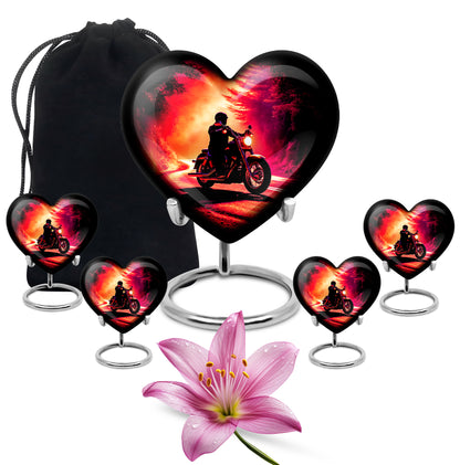 Midnight Black Bike Cremation Urn close-up of engraving and surface detail - romantic heart urn with bike motif on aluminum - memorial set with one large and four small urns