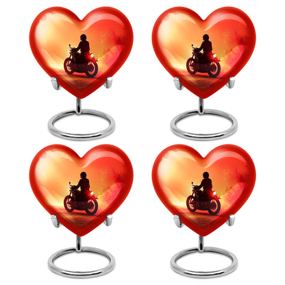 Deep Red Bike Cremation Urn angled view of lid and engraved motif - heart-shaped bike design symbolizing eternal love - 10 inch aluminum urn for cremated remains