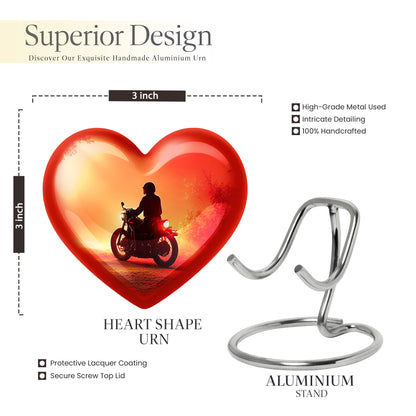 Ruby Red Bike Cremation Urn front view showing detailed design - romantic heart urn with bike motif on aluminum - mini keepsake memorial for portion of cremation ashes
