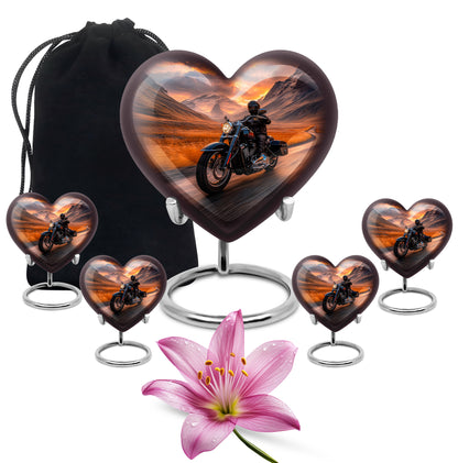 Scarlet Red Bike Cremation Urn close-up of engraving and surface detail - romantic heart urn with bike motif on aluminum - memorial set with one large and four small urns