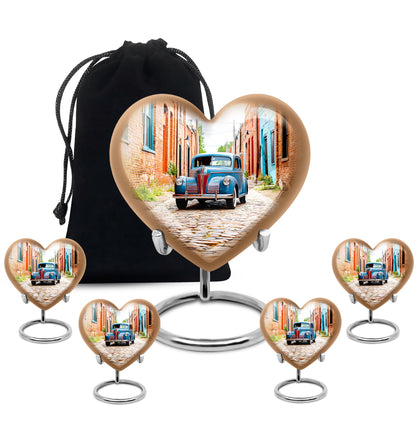 Chrome Silver Car Cremation Urn close-up of engraving and surface detail - romantic heart urn with car motif on aluminum - memorial set with one large and four small urns
