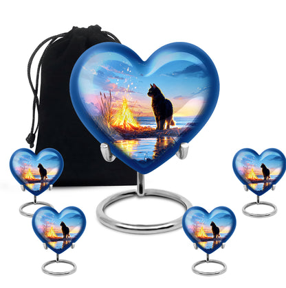 Indigo Cat Cremation Urn close-up of engraving and surface detail - heart-shaped cat design symbolizing eternal love - memorial set with one large and four small urns