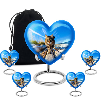 Royal Blue Cat Cremation Urn close-up of engraving and surface detail - romantic heart urn with cat motif on aluminum - memorial set with one large and four small urns