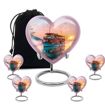 Garnet Red Boat Cremation Urn close-up of engraving and surface detail - loving heart memorial featuring boat pattern - memorial set with one large and four small urns