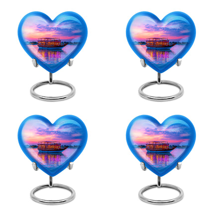 Misty Blue Boat Cremation Urn angled view of lid and engraved motif - heart-shaped boat design symbolizing eternal love - 10 inch aluminum urn for cremated remains