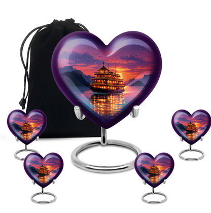Royal Purple Boat Cremation Urn close-up of engraving and surface detail - romantic heart urn with boat motif on aluminum - memorial set with one large and four small urns