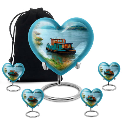 Tropical Teal Boat Cremation Urn close-up of engraving and surface detail - romantic heart urn with boat motif on aluminum - memorial set with one large and four small urns