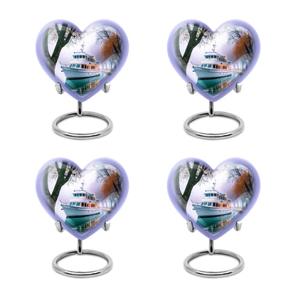Alabaster White Boat Cremation Urn angled view of lid and engraved motif - heart-shaped boat design symbolizing eternal love - 10 inch aluminum urn for cremated remains