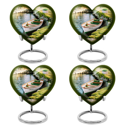 Warm Yellow Boat Cremation Urn angled view of lid and engraved motif - heart-shaped boat design symbolizing eternal love - 10 inch aluminum urn for cremated remains