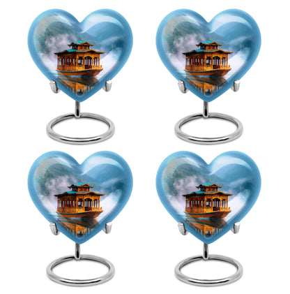Pastel Blue Boat Cremation Urn angled view of lid and engraved motif - heart-shaped boat design symbolizing eternal love - 10 inch aluminum urn for cremated remains