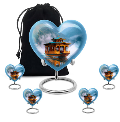Sky Blue Boat Cremation Urn close-up of engraving and surface detail - heart-shaped boat design symbolizing eternal love - memorial set with one large and four small urns