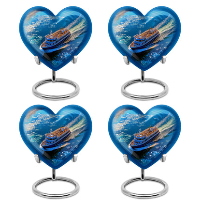Icy Blue Boat Cremation Urn angled view of lid and engraved motif - loving heart memorial featuring boat pattern - 10 inch aluminum urn for cremated remains