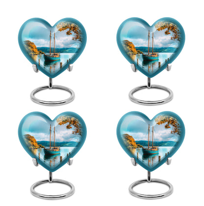 Mystic Teal Boat Cremation Urn angled view of lid and engraved motif - compassionate heart-boat combination with gentle curves - 10 inch aluminum urn for cremated remains