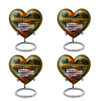 Moss Green Boat Cremation Urn angled view of lid and engraved motif - loving heart memorial featuring boat pattern - 10 inch aluminum urn for cremated remains