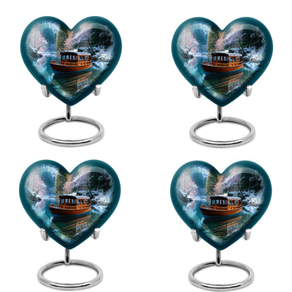 Serene Blue Boat Cremation Urn angled view of lid and engraved motif - romantic heart urn with boat motif on aluminum - 10 inch aluminum urn for cremated remains
