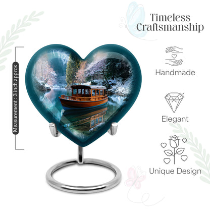 Bright Blue Boat Cremation Urn front view showing detailed design - compassionate heart-boat combination with gentle curves - mini keepsake memorial for portion of cremation ashes