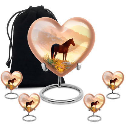Gilded Gold Horse Cremation Urn close-up of engraving and surface detail - heart-shaped horse design symbolizing eternal love - memorial set with one large and four small urns