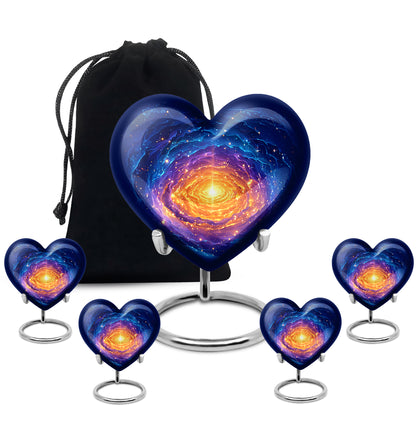 Indigo Galaxy Cremation Urn close-up of engraving and surface detail - heart-shaped galaxy design symbolizing eternal love - memorial set with one large and four small urns