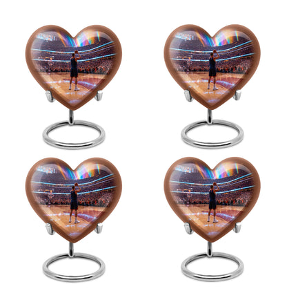 Obsidian Black Basketball Cremation Urn angled view of lid and engraved motif - compassionate heart-basketball combination with gentle curves - 10 inch aluminum urn for cremated remains