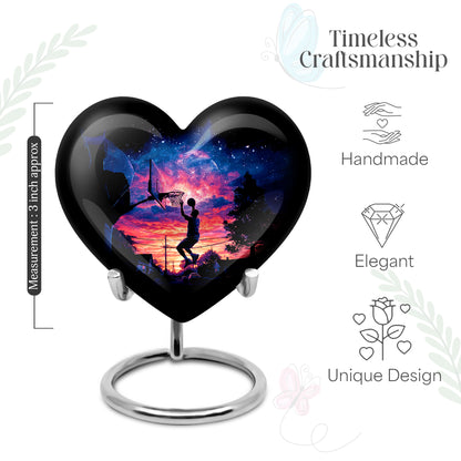 Charcoal Black Basketball Cremation Urn front view showing detailed design - compassionate heart-basketball combination with gentle curves - mini keepsake memorial for portion of cremation ashes