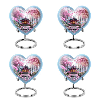 Coral Pink Cherry Blossom Cremation Urn angled view of lid and engraved motif - heart-shaped cherry blossom design symbolizing eternal love - 10 inch aluminum urn for cremated remains