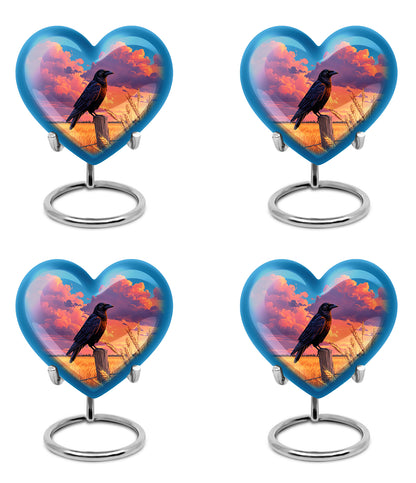 Dusty Blue Crow Cremation Urn angled view of lid and engraved motif - heart-shaped crow design symbolizing eternal love - 10 inch aluminum urn for cremated remains