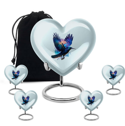 Satin Silver Crow Cremation Urn close-up of engraving and surface detail - heart-shaped crow design symbolizing eternal love - memorial set with one large and four small urns