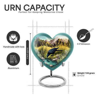 Mystic Teal Crow Cremation Urn front view showing detailed design - compassionate heart-crow combination with gentle curves - mini keepsake memorial for portion of cremation ashes