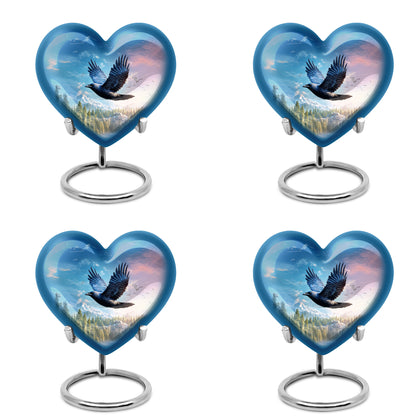 Bright Blue Crow Cremation Urn angled view of lid and engraved motif - compassionate heart-crow combination with gentle curves - 10 inch aluminum urn for cremated remains