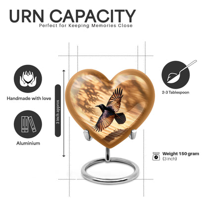 Champagne Gold Crow Cremation Urn front view showing detailed design - heart-shaped crow design symbolizing eternal love - mini keepsake memorial for portion of cremation ashes