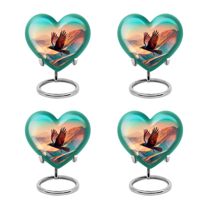 Deep Teal Crow Cremation Urn angled view of lid and engraved motif - compassionate heart-crow combination with gentle curves - 10 inch aluminum urn for cremated remains